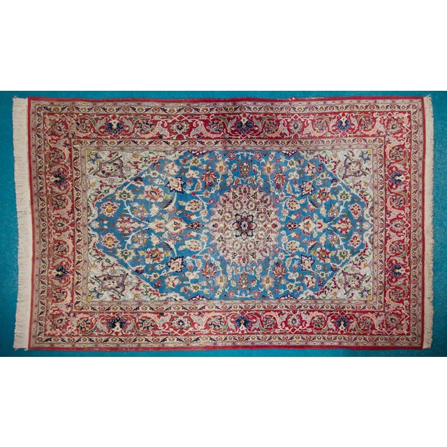 Hand-knotted rug from Tabriz, one of the most important centers of traditional rug production. The rug is made of wool...