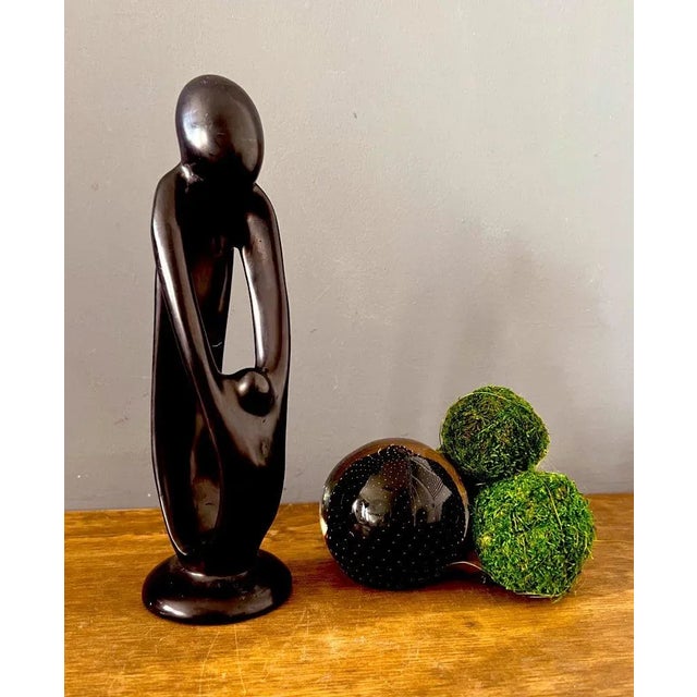 Besmo Kenya hand carved soapstone sculpture of a mother and child. Beautiful modern style hand carved sculpture. Very...