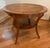 3’-0”diameter x 2’-4”H Biedermeier “Vienna” warm toned walnut finish side table.