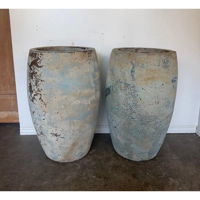 A striking and highly coveted pair of monumental bullet-form planters in the revered manner of Atelier Vierkant, Belgium....