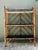 Elevate your interior with the exotic allure of this vintage Chinoiserie bamboo etagere. A masterclass in eclectic design,...