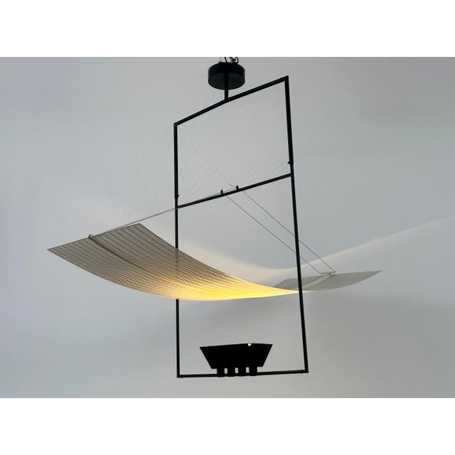 Extremely rare, lovely and highly decorative post-modern chandelier or pendant lamp. Model 'zefiro'. Designed by the star...