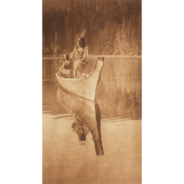 A photogravure restrike after a photograph by American photographer Edward Curtis (1868-1952). Titled "At Nootka," the...