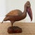 MIDCENTURY CHINESE FIGURAL WOVEN WICKER PELICAN BIRD BOX. Large wicker box in the form of a pelican. The piece with stand...