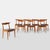Set of 8 W2 Dining Chairs by Hans J Wegner Denmark, c 1950s A set of eight W2 oak dining chairs featuring an inset black...