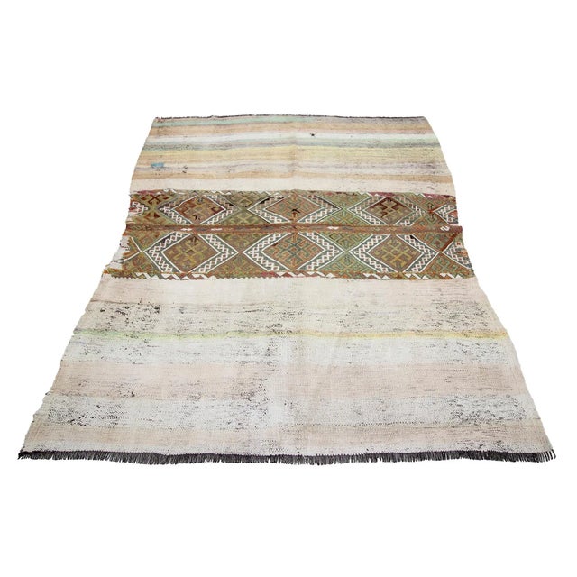 Decorative handwoven vintage kilim rug from Marash region of Turkey. Approximately 50-60 years old. In very good condition