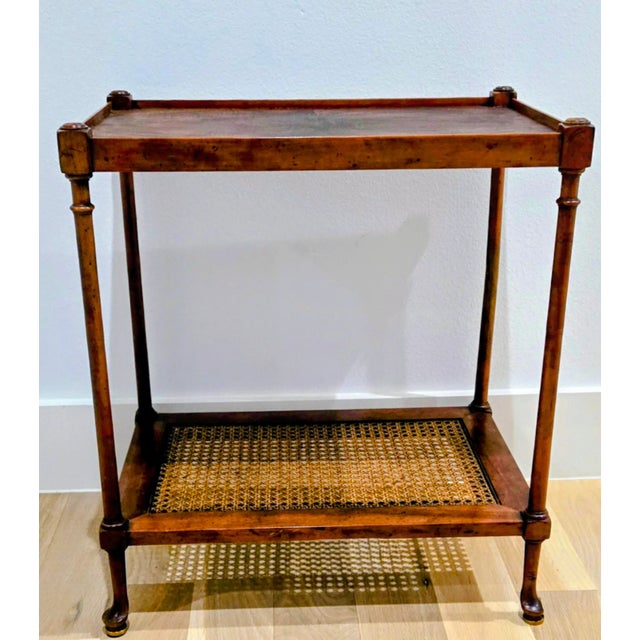 Elevate your space with this elegant Baker Furniture reed end table, a true testament to timeless design and superior...