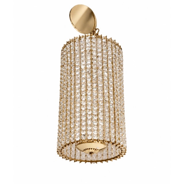 A stunning crystal mid-century cylindrical pendant composed of a brass frame and sparkling, faceted crystal beads. The...