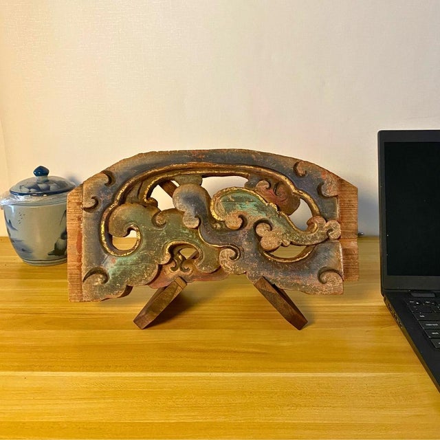 A 1920s Chinese architectural wood fragment, hand-carved and mounted as a tabletop sculpture. Originally part of a timber-...