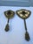 A beautiful brass filigree vanity mirror and brush set with jeweled (cut glass) center pieces. The cut glass is an...