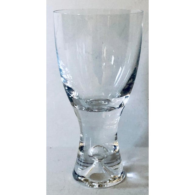 Elegant hand blown Finnish 5 oz. juice glasses with an air bubble blown into the thick stem giving these good bottom...
