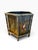 This is a gorgeous painted metal wastebasket. Its a hexagon shape and sits in a worn green six leg holder. It would be...