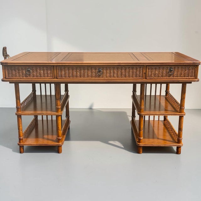 A beautiful natural colored faux bamboo 3 drawer desk. Measures a sizable 30” x 31” x 60”. Practical for home or office....