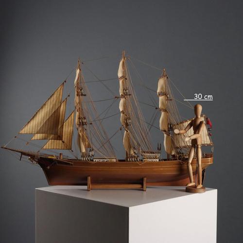 Hand-built wooden sailing ship. This piece is attributed to the mentioned designer/maker. It has no attribution mark and...
