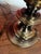 This vintage pair of MCM brass candlestick style electric lamps exudes Hollywood Regency glam with a nod to classic...