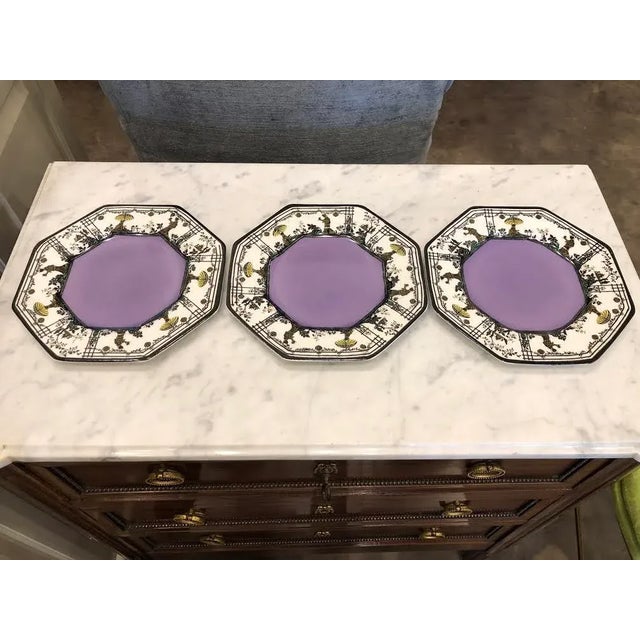 This is a fabulous trio of decorative vintage plates. They feature a great lavender color with black and white detail of a...