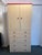 Design Plus Gallery presents a Dressing Armoire with Maple Veneer and Red Accents. The tall armoire is a two piece that is...