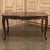 Antique French Walnut Regence Style Dining Table is a classic example of fine craftsmanship utilizing exquisite indigenous...