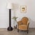 Large carved wood floor lamp by Charles Dudouyt from France, 1940s. Heavy stem with carved design on circular base with...