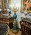 An impressive piece of Louis XVI-style candelabra with shaped porcelain bases, each hand-painted with finely detailed...