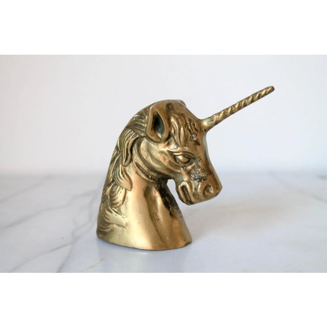 Vintage brass unicorn paper weight. No makers mark. Minor age wear. Patina.
