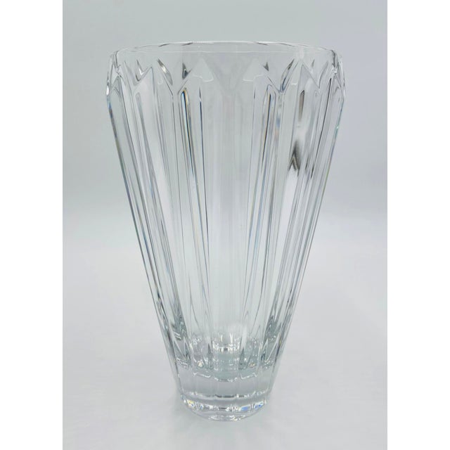 A striking vintage crystal vase by Kosta Boda, showcasing the brand’s celebrated mastery of Scandinavian art glass. This...