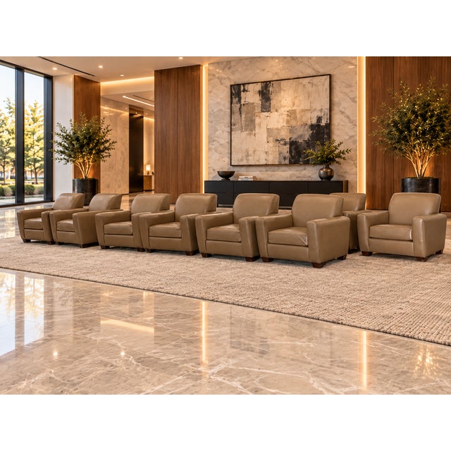 An exceptional collection of eight matching genuine leather club chairs by Thayer Coggin, the distinguished American...
