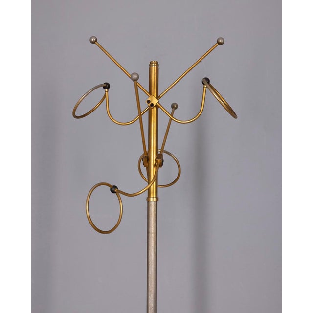 Floor coat rack with marble base, metal frame and gold-plated brass hangers, Italian design, 1960s.