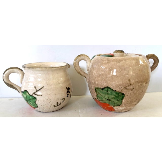 This unusually available Japanese hand thrown wabi sabi pottery has a country rustic form with whimsical pattern of colors...