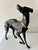 Fantastic brass sculpture of hunting dog, lots of movement in this pose, one leg up and curled tail. Attributed to the...