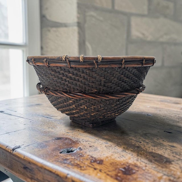 A finely woven mid-century utilitarian labba basket crafted by the Kalinga people of the Cordillera region in Northern...