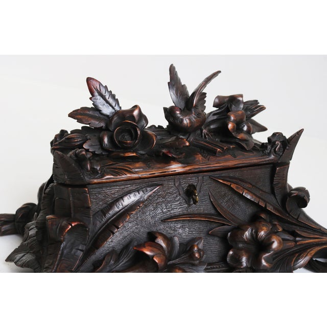 A true masterpiece, this fully hand-carved 19th-century Black Forest jewelry box from Switzerland is a remarkable work of...