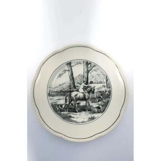 A beautiful black and off-white English porcelain plate depicting a country scene with horse, hunting dogs, and fowl...