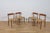 This set of four dining chairs was designed by Arne Hovmand Olsen and produced by Mogens Kold in Denmark during in the...