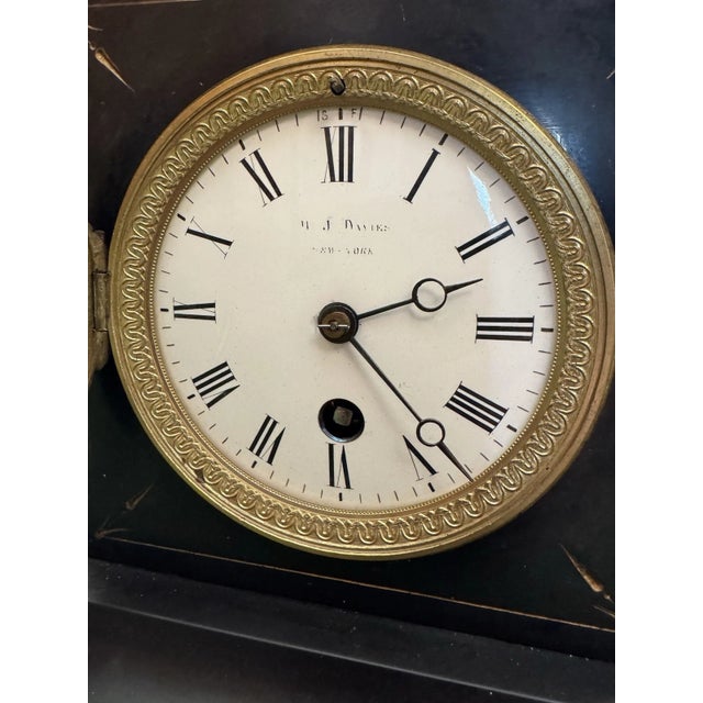 This listing is for a nice antique French mantel clock. The case is made from carved slate stone and has nice etched...