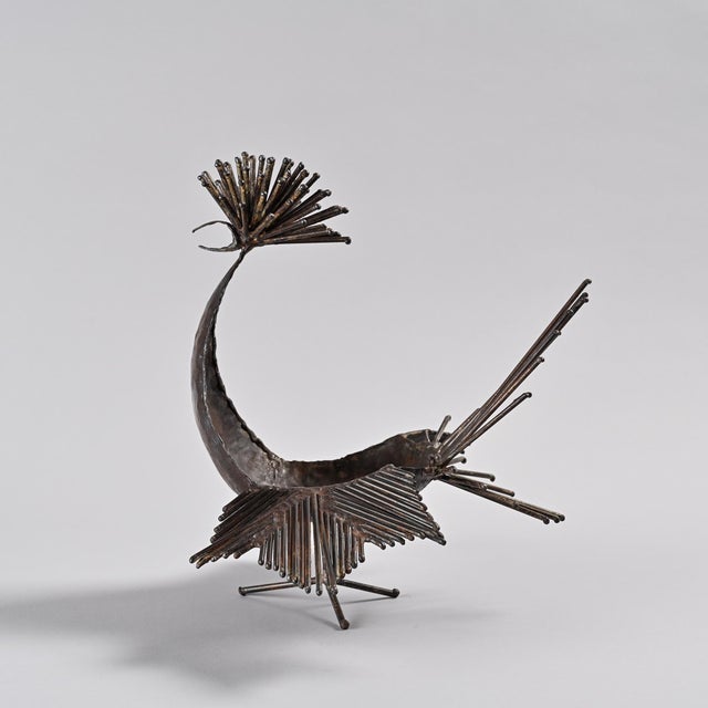 Zoomorphic sculpture in welded iron depicting a rooster by Michel Anasse, a French ceramist, painter, and above all,...