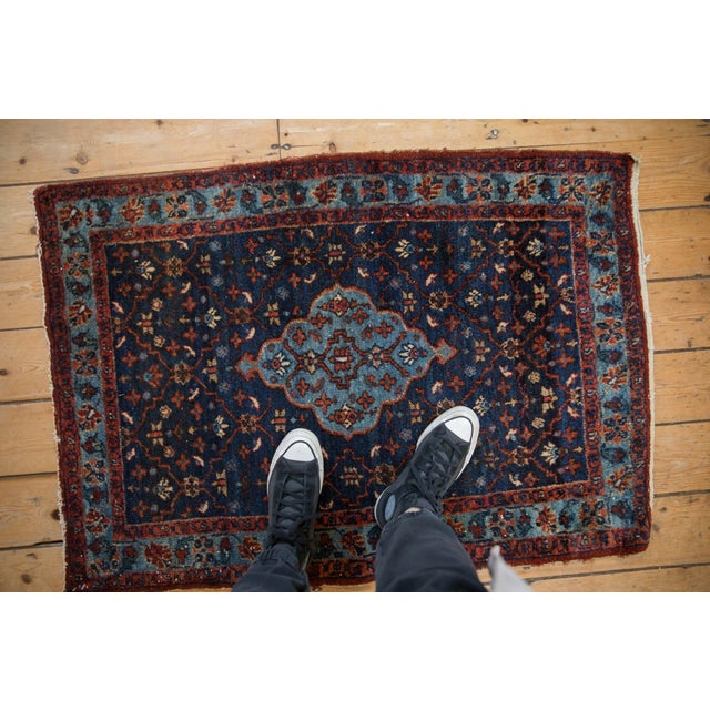 :: Scalloped center medallion atop a covered field of trellis delineated panels bearing interior floral fills. Unique and...