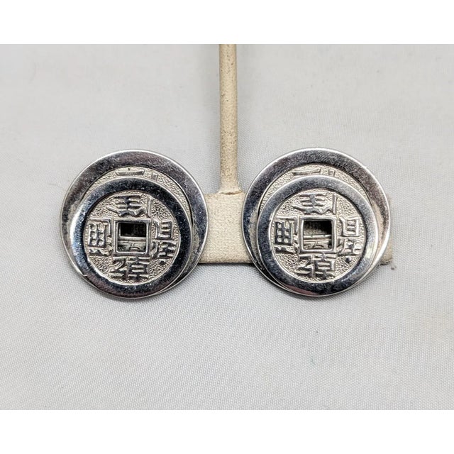 Metal Vintage Signed Napier Doris Day Rhodium Plated Two Stacked Asian Coins Clip Earrings-2 Pieces For Sale - Image 7 of 9