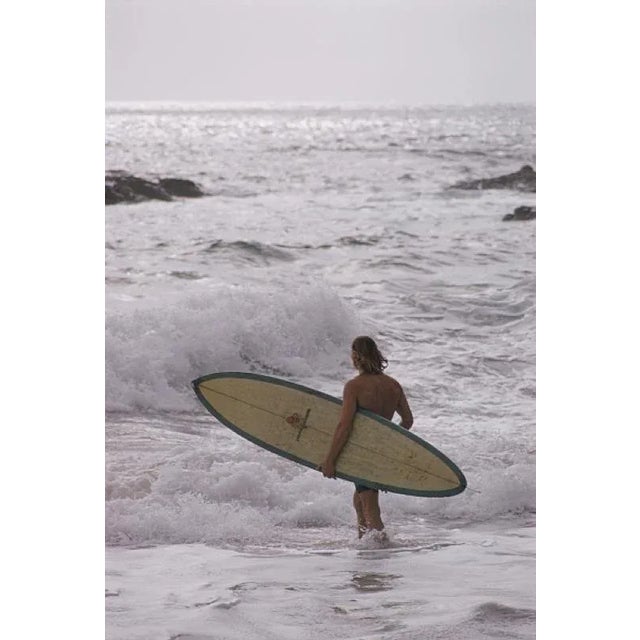 Laguna Beach Surfers 1970 A surfer in the sea at Laguna Beach, California, January 1970. Photo by Slim Aarons Slim Aarons...