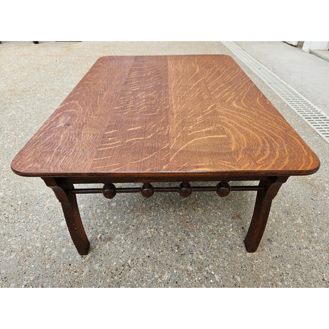 A beautiful antique quarter-swan oak low side table or plantstand with distinctive woodgrain. The apron of this low side...