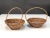 Pair of fantastic Mid-Century Modern decorative rattan and bamboo decorative bowls. These pieces were produced in Italy...