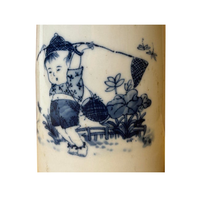 Chinese Distressed White Porcelain Blue Kid Playing Graphic Holder Vase For Sale - Image 4 of 10