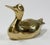 Vintage brass duck figure with detailed wings and upturned head. For use as paper weight or decorative object. Heavy,...