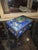 Beautiful antique Chinese enamel box with faux jade carved medallion. This is hinged box and has a blue enamel interior....