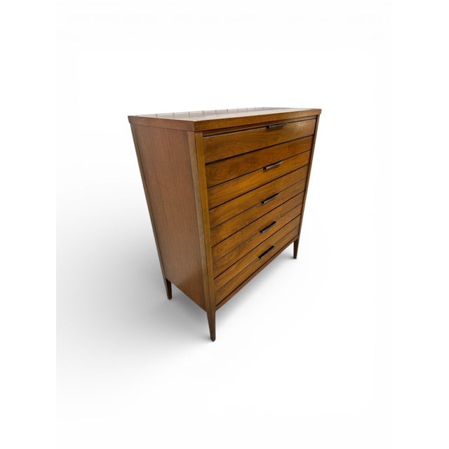 This striking Mid-Century Modern Lane “Tuxedo” high chest is a perfect blend of bold design and functional storage....