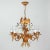 This beautiful gilt chandelier was designed and manufactured in Germany in the 1970s by Hans Kögl Leuchten. It features 5...