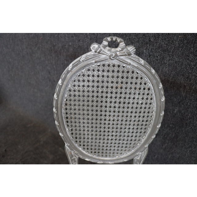 Louis XV style cane boudoir/vanity chair made in Italy.