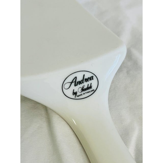 Andrea by Sadek violets pattern cake plate and server. Measures 11” diameter.