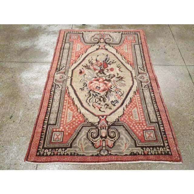 An antique Turkish Ghourdes accent rug handmade during the Early 20th century. Measures: 4' 0" x 6' 0"