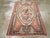 An antique Turkish Ghourdes accent rug handmade during the Early 20th century. Measures: 4' 0" x 6' 0"
